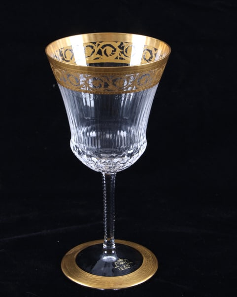 Crista France Saint Louis Thistle Gold Stem Goblet: Featured in this lot is this Saint Louis Thislte Gold stemmed goblet out of Crista, France. The goblet features a wonderfully and professionally crafted crystal and gold lined rims and feet. a set of