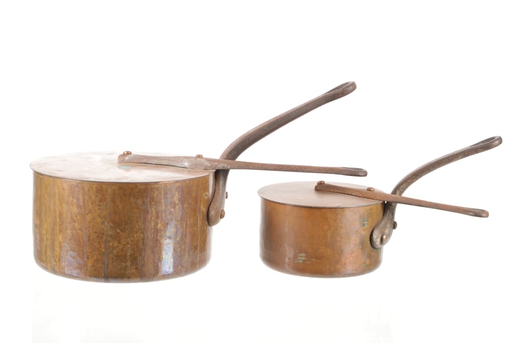 Ca. 1930- E. Dehillerin Paris, France Copper Pans: The lot features four pieces of original circa 1930-1950?s E. Dehillerin Paris, France copper cookware. The lot includes two pots that are each marked, ?E. DEHILLERIN PARIS? inside an oval, these are