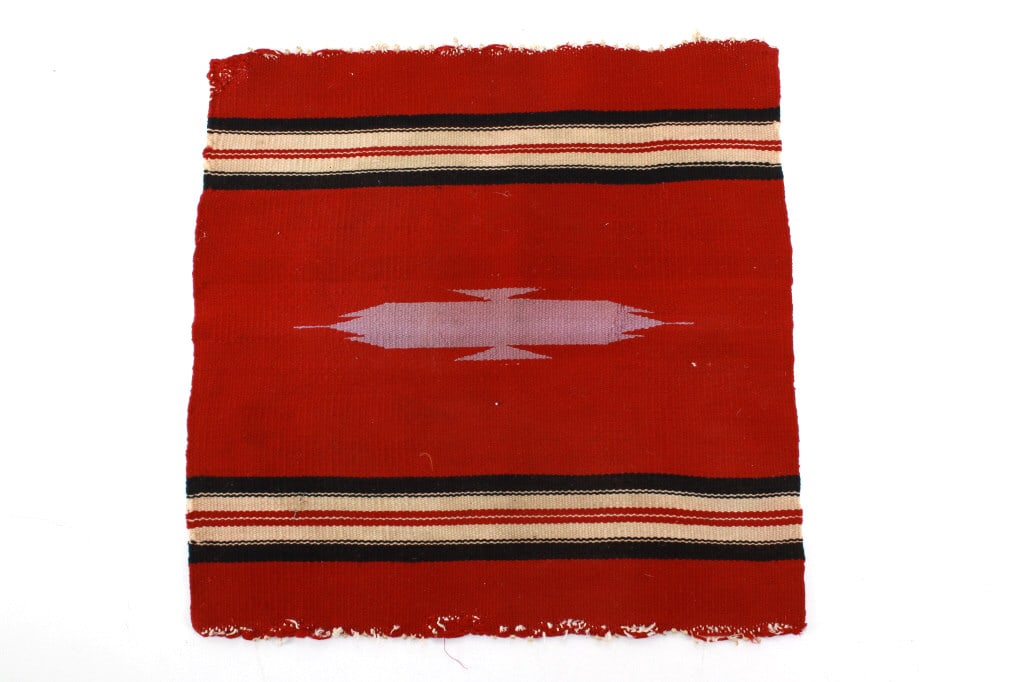 Circa 1930's Mexican Saltillo Sampler Rug: The lot features a circa 1930’s Mexican Saltillo sampler weaving rug. The weaving shows a nice tight weave with colors of red black, cream / light tan, and light purple, all of which are aniline dye