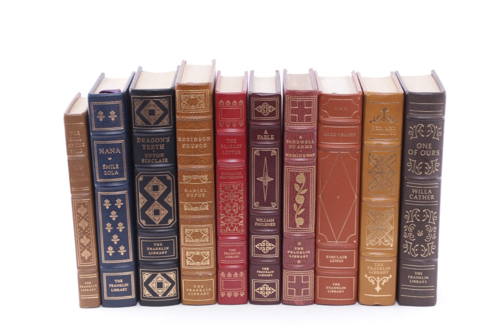 Franklin Library Leather Bound Books 1975-81 (10): Featured in this lot are ten Franklin Library leather bound & gilt fiction/novel books from various authors, presented by The Franklin Library circa 1975-1981. The books in this collection are fiction
