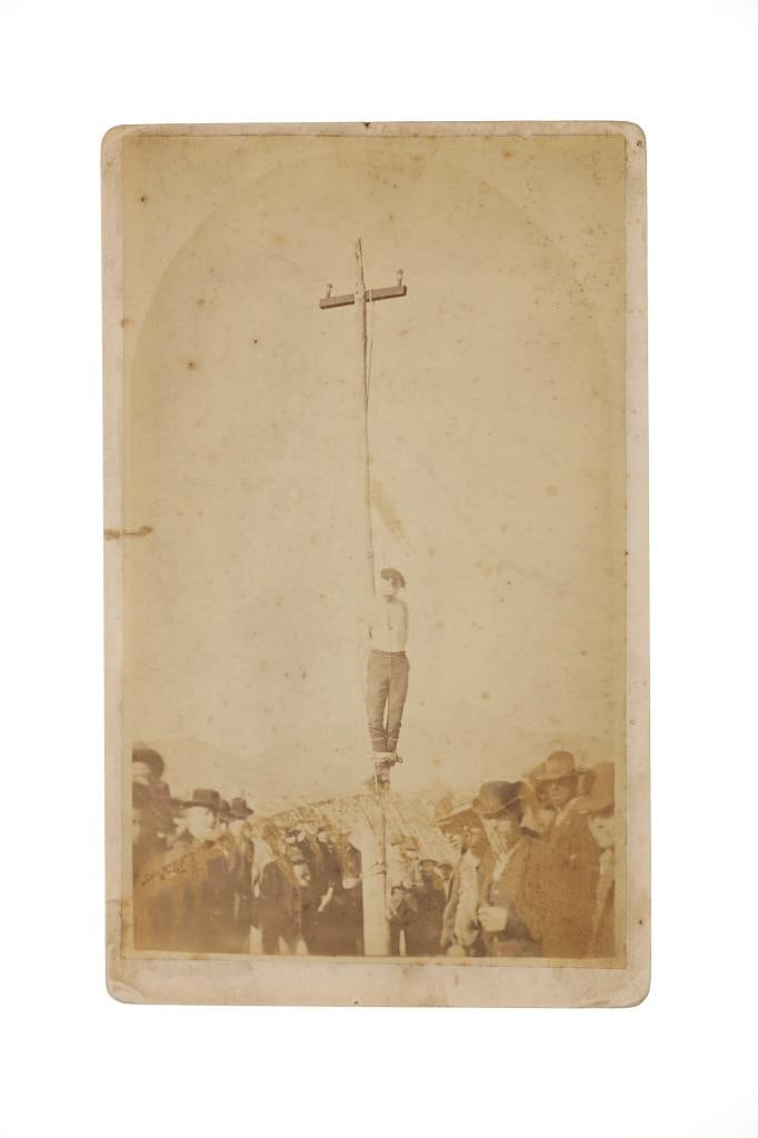 Lynching of John Heath Photo by C.S. Fly ca. 1884: The lot features another, truly historic and important photograph by C.S. Fly circa 1884 of the Lynching and Hanging of John Heath in Tombstone, Arizona Territory for being involved in the Bisbee Mass