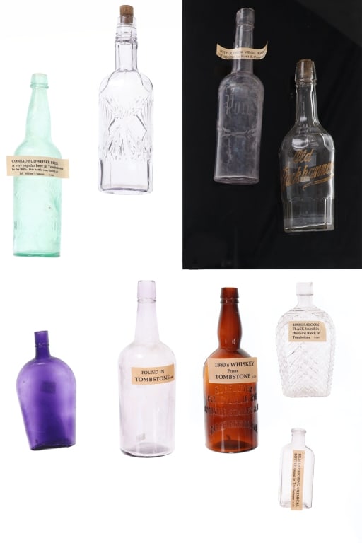 Various Glass Bottles From Tombstone 19th C (9): For your consideration are nine various liquor, flask and chemical bottles found in Tombstone, Arizona, with one found near Virgil Earp's outhouse in the late 1880s to early 1900s. The first and small