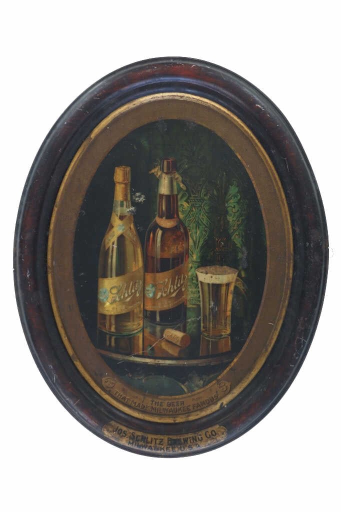 Schlitz Beer Metal Advertisement Sign Early 1900s: For your consideration is this Schlitz Beer lithographed metal sign from the early 1900s. Schlitz Brewing Company, known for its iconic beer "Schlitz," traces its roots to a small brewery in Milwaukee