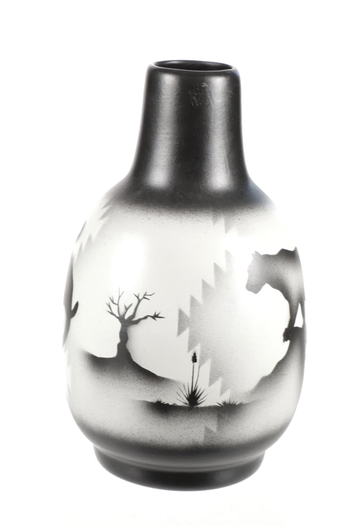 Cedar Mountain Mesa Mountain Lion Pottery Vessel: Featured in this lot is this Cedar Mountain Mesa mountain lion pottery vessel. The pottery features a wonderfully and professionally crafted ceramic construction that shows a layered design of mountai