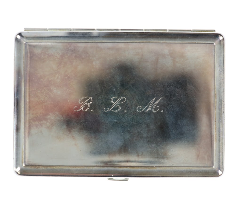 Men's Personal "B.L.M." Stainless Steel Tissue Box: The condition of this men's personal "B.L.M." polished stainless steel tissue box. The box features a wonderfully and professionally crafted stainless steel construction that shows a tissue receiver c
