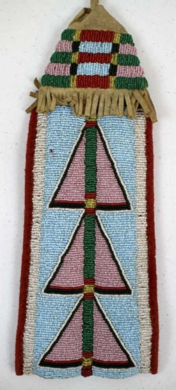 Sioux Beaded Strip for Tomahawk: This piece features tight Sioux Native American hand made beadwork, brass trade bells, and old trade felt. The beadwork is in great condition and features the Buffalo Track symbol. The top has geometr