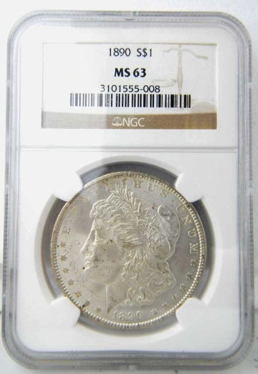 1890 Morgan Silver Dollar NGC MS63: This coins was struck at the Philadelphia Mint in 1890. The coin was graded and sealed by Numismatic Guaranty Corporation. Graded at Mint State 63 which means this is an uncirculated coin. Solid Strik