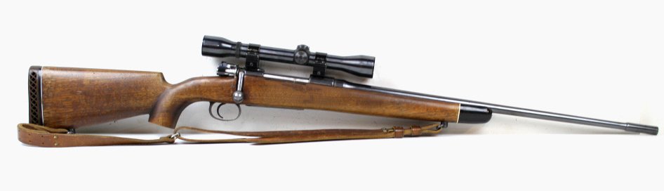 WWII Mauser G 33/40 .270 Rifle: This is a German Nazi Mauser Gun with a custom stock. This gun is marked with the Nazi coat of arms, but has been fitted with both a custom stock with inlays and a Weaver K4-E Scope. This is a very go