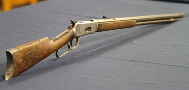 1894 Winchester Octagon Barrel Eskimo Carvings: This rifle is an 1894 Winchester Repeating 38-55 Rifle with Octagon Barrel. This has the Original Stock with very rare and unique Inuit Eskimo Carvings. One Side features a Polar Bear and the other ha