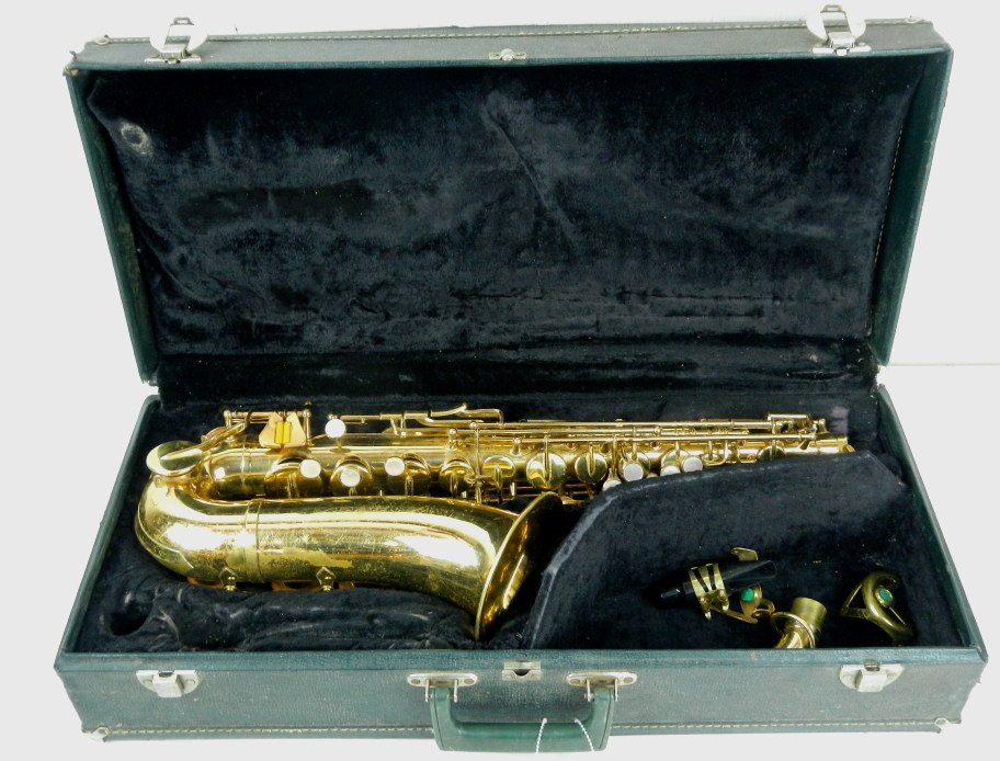 Brass Saxophone: This lot features a Saxophone made of Brass and also has the case. The instrument has been used and shows signs of wear. Box measures 24.5"x11" and 6" deep.