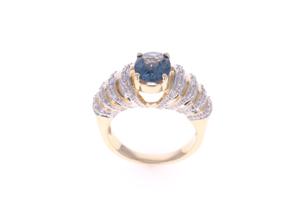 1.77ct Spinel & VS2 Diamond 14k Two Tone Gold Ring: Featured in this lot is this 1.77ct Spinel and VS2 diamond 14k yellow gold ring with GGA paperwork. The ring features a polished, stamped, and tested 14k two tone gold construction and is a gross weig