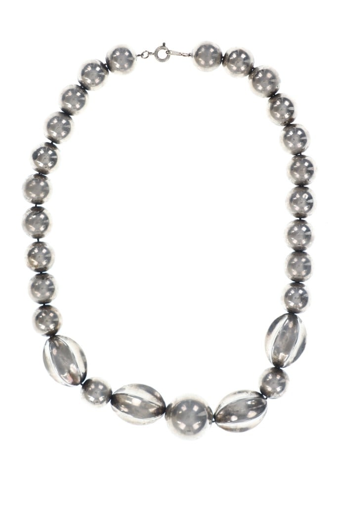 Taxco, Mexico Silver Beaded Silver Pearl Necklace: Featured in this lot is this Taxcop, Mexico silver beaded silver pearl necklace. The necklace features a wonderfully and professionally crafted silver construction that shows silver pearls and unique