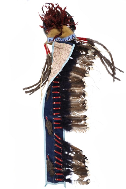 Blackfoot Piegan Buffalo Beaded Headdress - Mont.: This is a fabulous polished buffalo horn beaded headdress with long feather trailer from the Blackfoot Piegan of Northern Montana outside Glacier National Park from the mid-20th century. The piece sho
