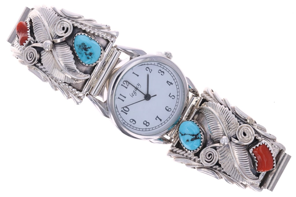 Navajo Running Bear Trading Sterling Watch Band: Featured in this lot is a Vintage Navajo Running Bear Trading Group Sterling Silver Multi-Stone Flexible Watch Band, circa 1950s to 1980s. The watch band features a wonderfully and professionally craf