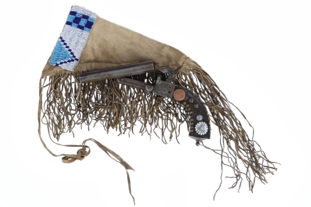 Plains Beaded Sheath & 1850 Civil War Pistol: The lot features a beaded Indian hide holster sheath from the Plains paired with a circa 1850 U.S. Civil War double-barrel, breech loading, hidden trigger and engraved pistol with tacking. The pistol