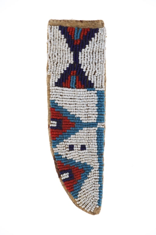Ca. 1890 Sioux Beaded Parfleche Hide Belt Sheath: The lot features a parfleche rawhide and Indian hide beaded belt knife sheath from the Northern Plains Sioux dating to circa 1890-1900's. The sheath body consists of parfleche rawhide sinew sewn with
