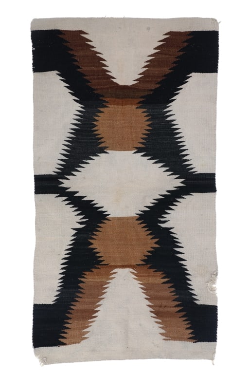 Navajo Crystal Eye Dazzler Trading Post Rug c1940s: Featured in this lot is this Navajo Crystal Eye Dazzler Trading Post rug circa 1940's. The rug features a wonderfully and professionally crafted wool construction that shows a large segment of eye daz