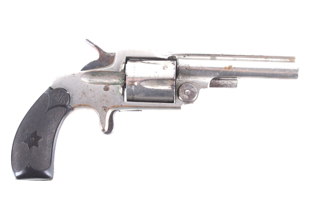 Otis Smith New Model Single Action 32 Cal Revolver: Featured in this lot we have an Otis Smith New Model single action revolver chambered in .32 caliber. The revolver displays a 3" long ribbed barrel, five shot cylinder, hard rubber grips, nickel finis