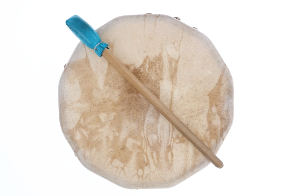 20th Century Northern Plains Indian Rawhide Drum: Featured in this lot is this Northern Plains Indian rawhide warrior drum circa 20th century. The drum features a wonderfully and professionally crafted wooden frame and rawhide wrapped construction th