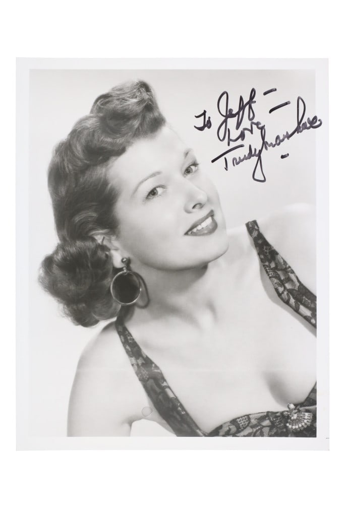 Actress Trudy Marshall Signed Studio Portrait: Featured in this lot is this original and signed photograph of actress / model, Trudy Marshall (1920-2004) from the 1950s. Gertrude Madeline "Trudy" Marshall was born in Brooklyn New York, NY and was
