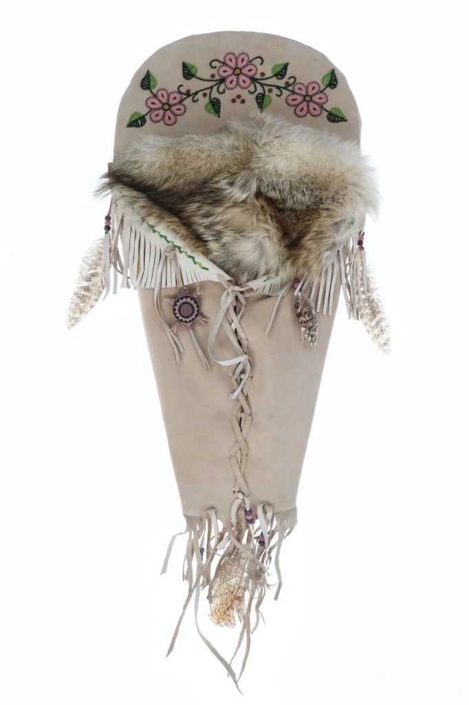 Montana Blackfeet Beaded Full Size Cradleboard: The lot features a full size, large beaded cradleboard papoose with turtle umbilical cord effigy from the Blackfeet / Blackfoot of Montana from the 20th-century. The papoose / cradle board features a
