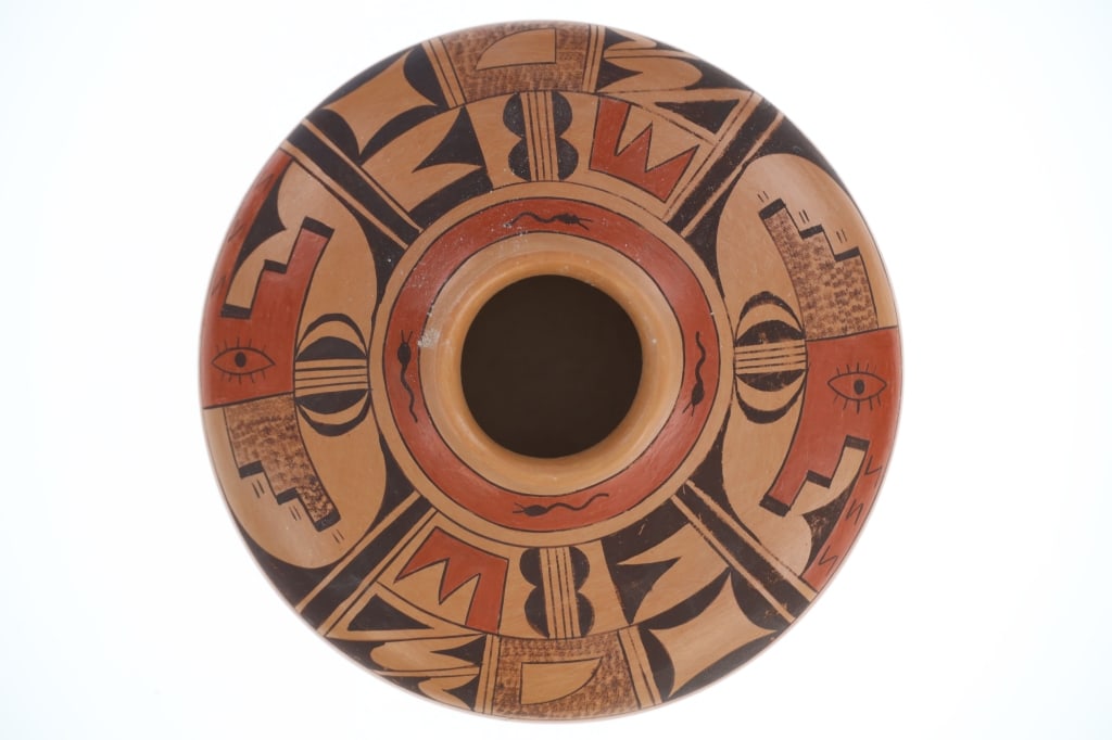 Hopi Karen Kahe-Charley (b. 1951) Polychrome Jar: The lot features a beautiful vintage Hopi polychrome yellowware pottery jar from artist Karen Kahe Charley (b. 1951, Hopi-Tewa). The pottery piece is signed on the bottom by Karen with her KCC and sho