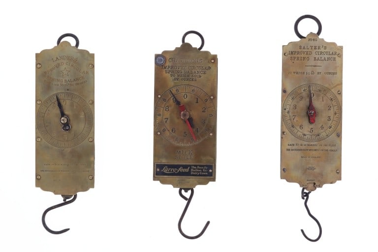 Antique Brass Hanging Mercantile Spring Balance's: Featured in this lot is this collection of antique brass hanging mercantile spring balance scales circa 19th century and all from different companies. There are three scales in this collection all for