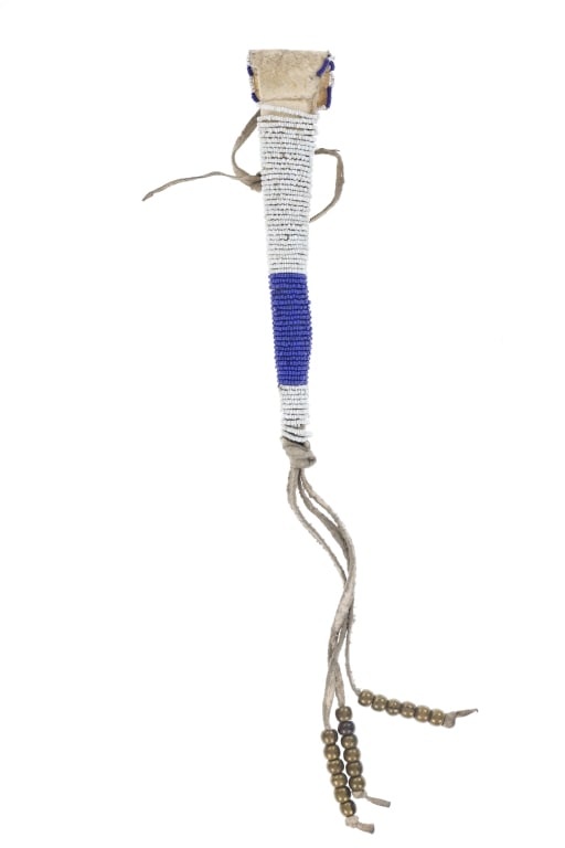 Ca. 1800's Southern Plains Awl Case ex-Christie's: The lot features an 1800's beaded hide rawhide awl case from the Southern Plains ex-Christie's Auction 2006 and private ex-Museum and Fine Native American collection from Eastern Montana. The piece ex