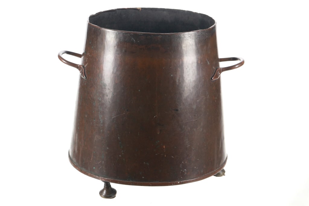 Copper Footed Umbrella Stand c. 1930's: Featured in this lot is this copper footed umbrella stand circa 1930's. The umbrella stand features a wonderfully and professionally crafted copper construction that shows two handles riveted on and s