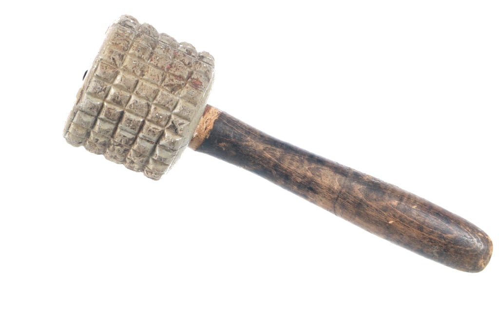 Ca. 1877 Stoneware Textured Meat Tenderizer Mallet: Featured in this lot is this stoneware textured meat tenderizer mallet circa 1877. The head of the mallet is marked "Pat'd Dec. 25, 1877" and is held by a solid wooden handle. The face around the mall