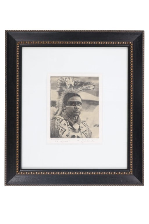 Bob Coronato Chine-Coll? "Natsehestahe" Etching: Featured in this lot is this etching titled "Natsehestahe" by Bob Coronato. The etching features a portrait that shows Cheyenne Indian man with a hair roach and traditional garments and war paint acro
