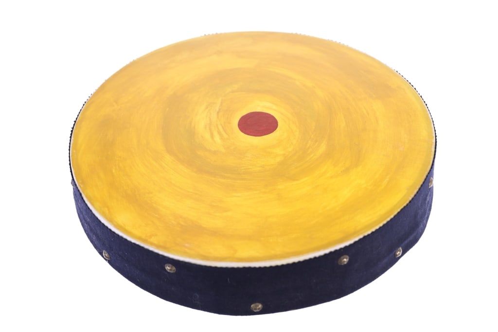 Blackfeet Piegan Little Dog Painted Drum Glacier: The lot features a stretched hide painted drum from the Blackfeet of Northern Montana, noted as being owned by Little Dog acquired from an estate out fo East Glacier, Montana in 2012. The piece featur