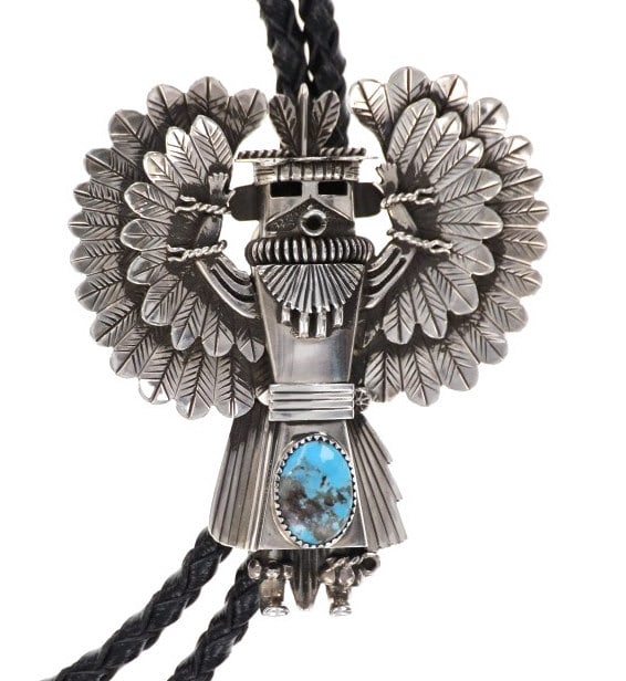 Rare Navajo Alvin Joe Eagle Dancer Kachina Bolo: This piece is by master Navajo silversmith Alvin Joe showing his highly collectible large sterling silver Kachina dancer bolo ties set with Bisbee Turquoise with a nice late-vintage 20th-century age.
