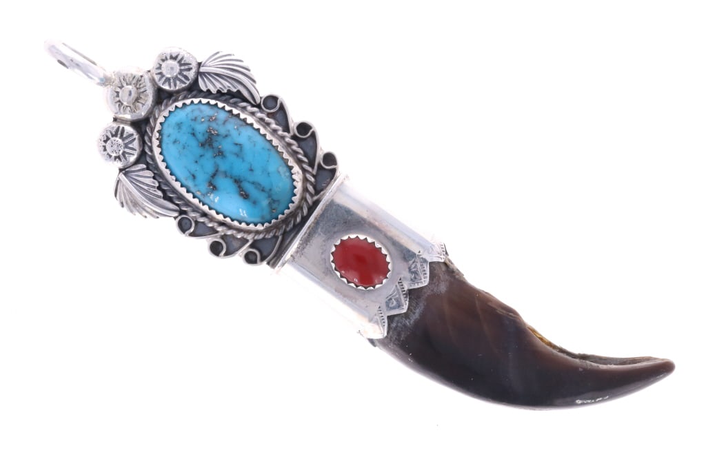 Navajo Brown Bear & Kingman Pendant - Signed: The lot features a fantastic Alaskan Brown Bear Claw sterling silver necklace pendant by Navajo silversmith Kenny Ray McNeilley Jr. and set with Morenci Turquoise and Oxblood Coral. The piece shows a