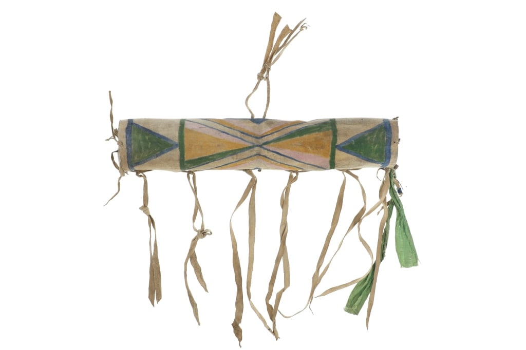 C1900 Blackfeet Chief Little Dog War Bonnet Case: The lot features a circa early 1900-1910?s polychrome painted parfleche war bonnet headdress case from Blackfeet Chief Little Dog, Last Pikunni War Chief, of all the Blackfeet from the Blackfeet India