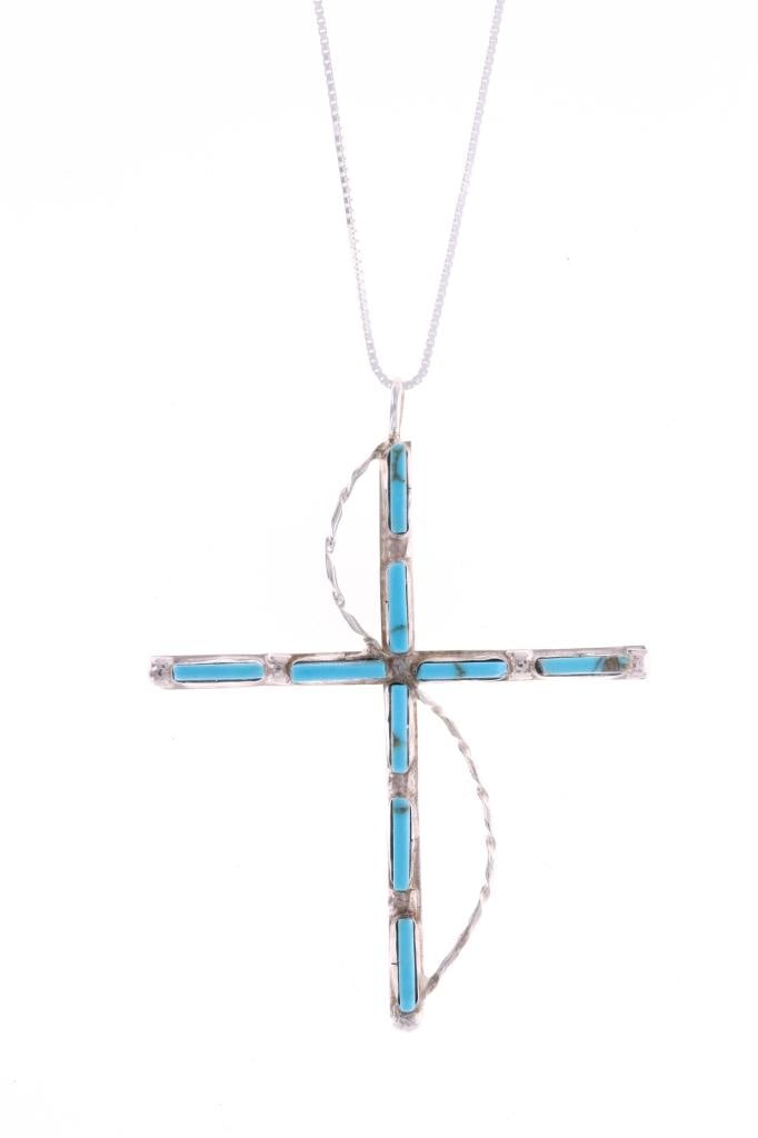Navajo Sterling Silver Turquoise Cross Necklace: Featured in this lot is this Navajo sterling silver petite point turquoise cross necklace. The necklace features a wonderfully and professionally crafted sterling silver and Cripple Creek turquoise