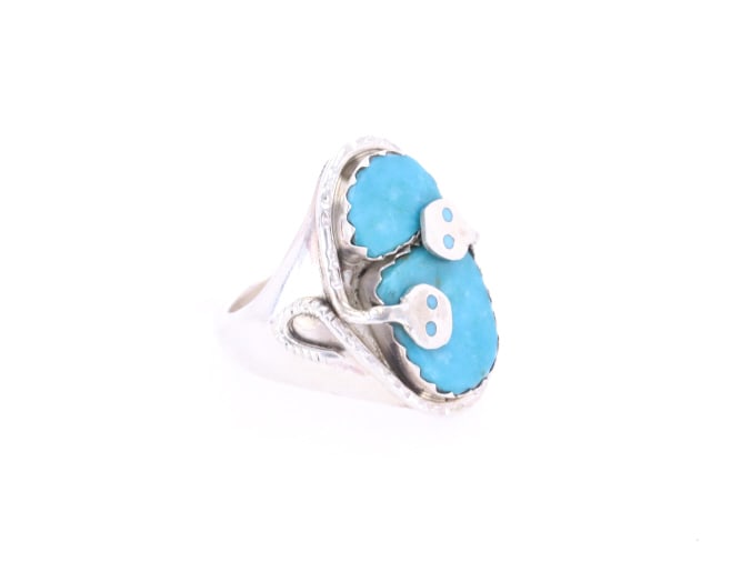Vintage Effie Calavaza (1927-2019 Zuni) Snake Ring: This is a fabulous vintage iconic snake ring by renowned Zuni Pueblo silversmith Effie Calavaza (1927-2019, Zuni). The ring is set with Sleeping Beauty Turquoise with Effie?s unmistakable and