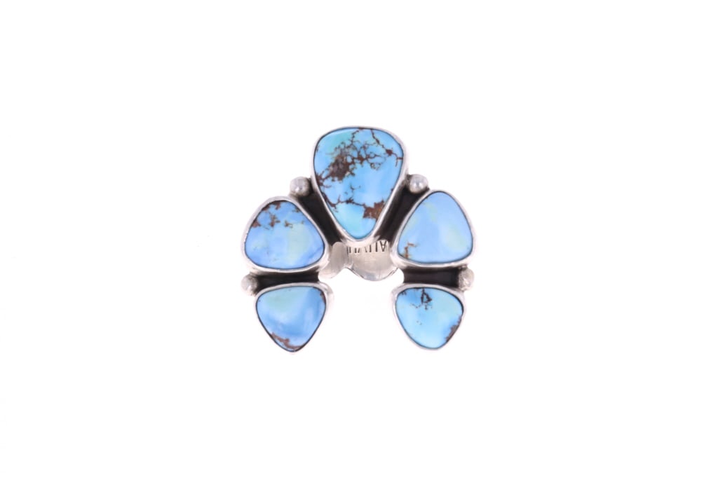 Navajo Sterling Silver Golden Hills Turquoise Ring: Featured in this lot is this Navajo sterling silver and Golden Hills Turquoise ring. The ring features a wonderfully and professionally crafted sterling silver construction that shows a thick band