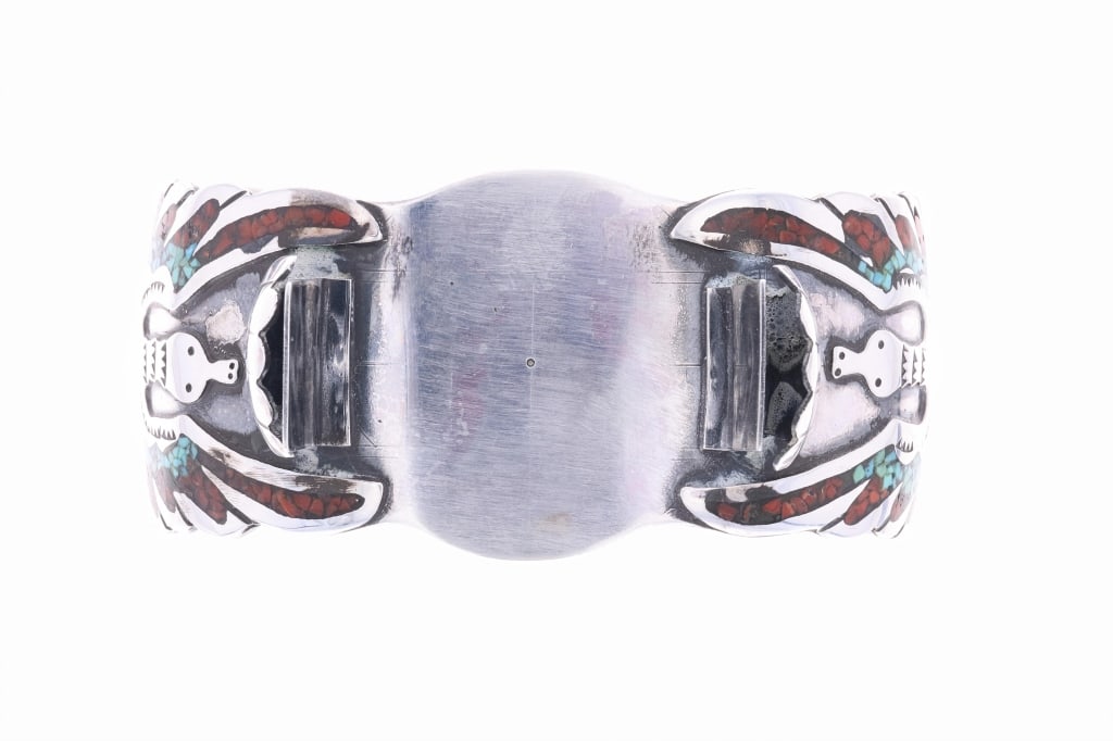 Vintage Pawn Zuni Chip Turquoise & Coral Cuff 1970: The lot features a fantastic vintage pawn chip inlaid turquoise and coral sterling silver watch cuff bracelet from circa 1970?s. The bracelet shows a peyote water bird design running down both sides i