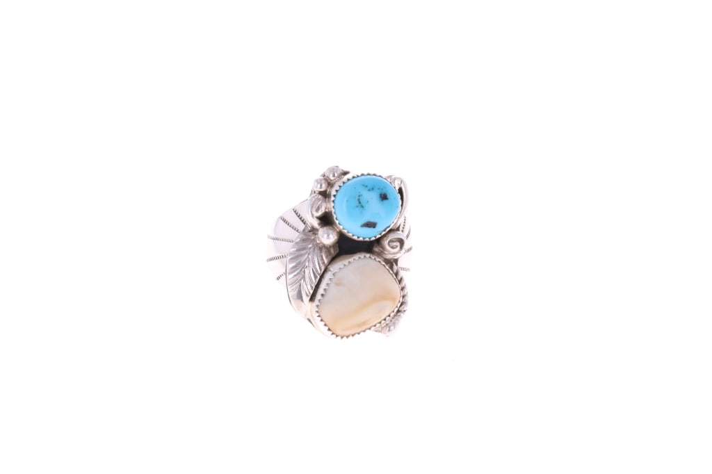 Navajo H. Tsosie Sterling Elk Ivory Turquoise Ring: Featured in this lot is this Sterling Silver Sleeping Beauty Turquoise and Elk Tooth Ivory Ring by Navajo artist Herbert Tsosie. This stunning ring features a wonderfully and professionally crafted