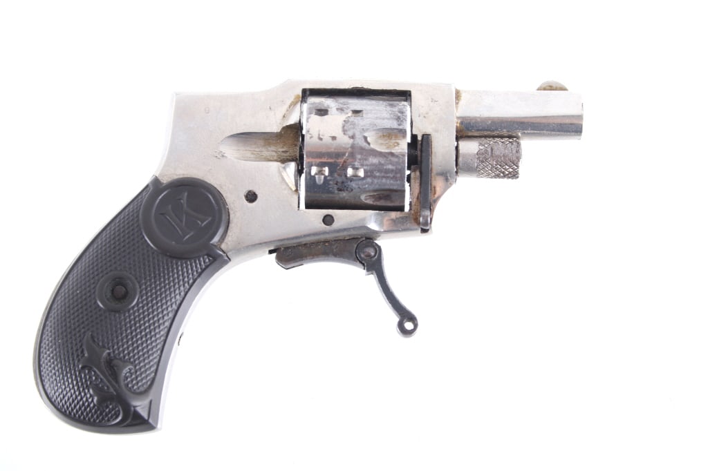 Kolb Baby Hammerless .22 Rim Fire Revolver: Tiny Kolb Baby Hammerless .22 Rim Fire folding trigger revolver. This vest pocket revolver was made in the 1890s and was a popular firearm with anyone wanting extreme concealment. Measuring only 4