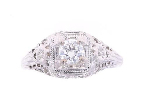 RARE 1920's Antique Art Deco 18K VS2 Diamond Ring: This is a fantastic Antique Art Deco circa 1920?s 18 karat white gold ring with VS2 diamond, accompanied with paperwork from AIGL. The ring is stamped 18K and shows a classic Art Deco pattern with a