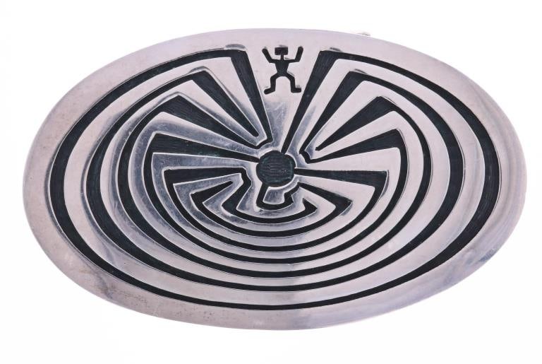 Hopi "Man in the Maze" Old Pawn Silver Buckle: Featured in this lot is this Hopi Old Pawn silver buckle with a traditional "Man in the Maze" emblem. The buckle features a wonderfully and professionally crafted sterling silver construction that sho