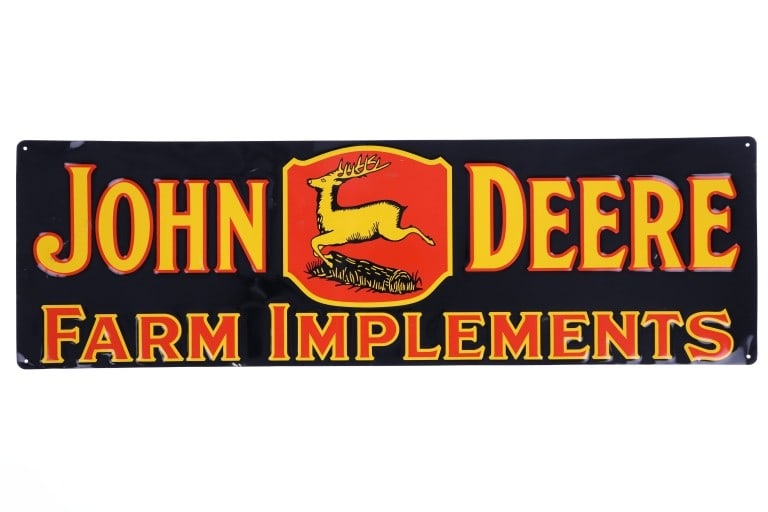 John Deere Reproduction Advertisement Sign: Featured in this lot is this John Deere, reproduction tin advertisement sign from the late 1990s / early 2000s. This sign shows an aluminum construction and advertises farm implements sold by John Dee