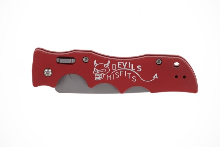 Rob Dalton "Devils Misfit" Switchblade Drop Point: Featured in this lot is this "Misift" switchblade knife made by renowned knife maker Rob Dalton. This switchblade features a bead blasted finished drop point blade. The blade is marked reading, "Dalto