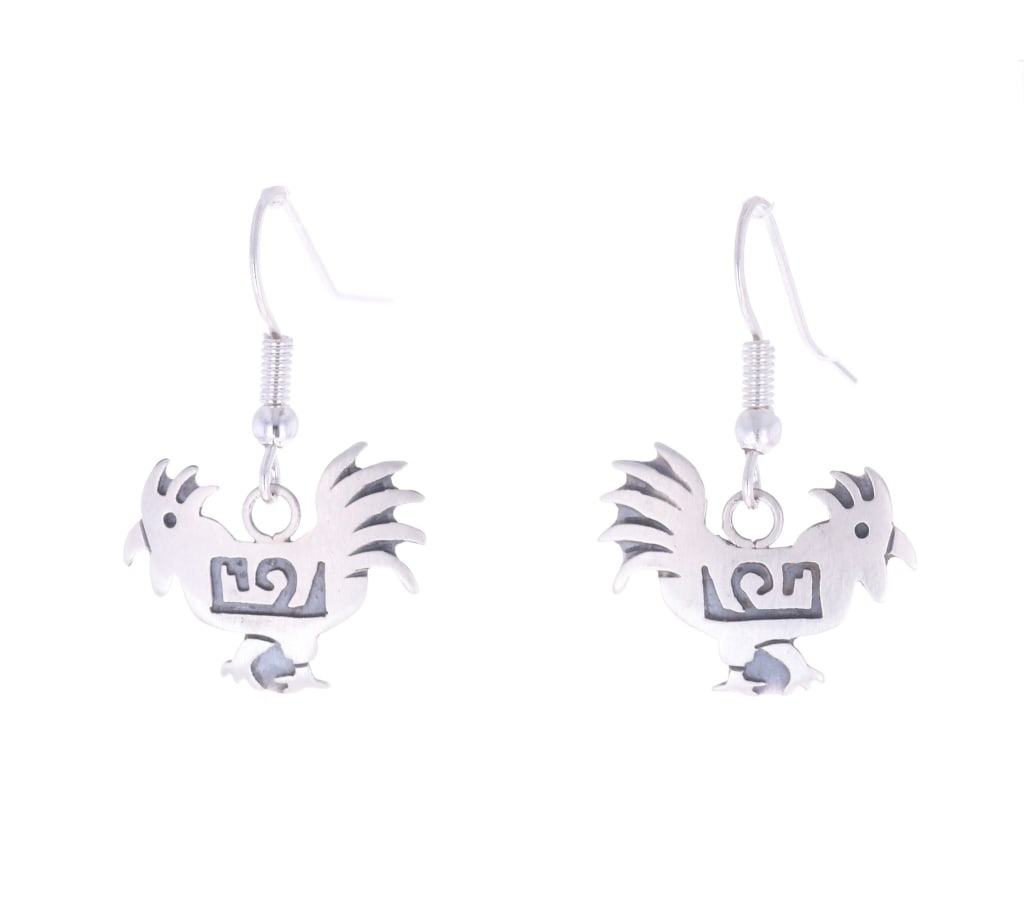 Navajo Dorothy Martinez Sterling Silver Earrings: Offered in this lot is a Navajo Din? Dorothy Martinez Sterling Silver Dangle Earrings. The earrings feature a professionally crafted Hand-stamped rooster with stamped geometric designs. Dorothy is a s