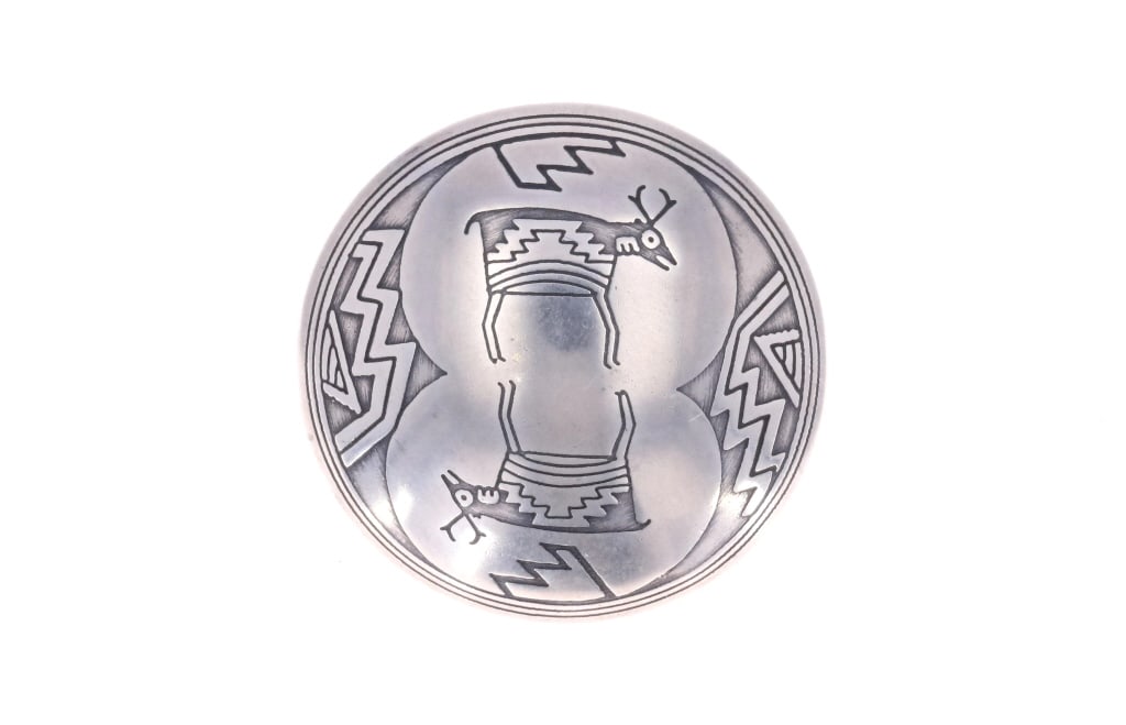 Native American Sterling Deer Effigy Pin: For your consideration is this sterling pin with Native American deer effigies. The sterling pin shows a circular shape with a slight dome style present. The front shows two deer effigies mirrored acr
