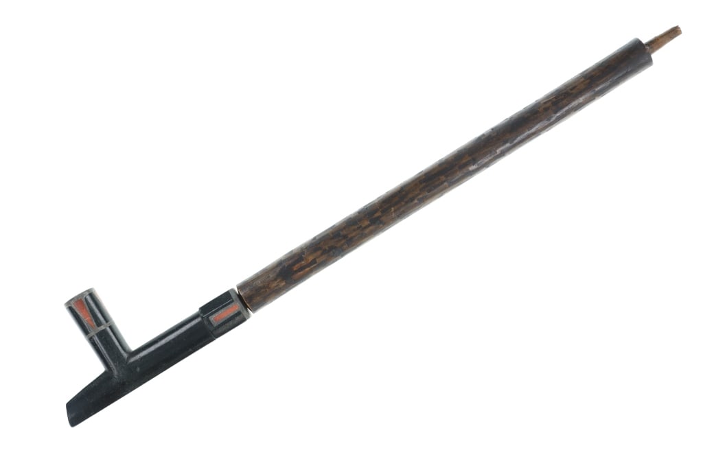Circa 1860 Lakota Sioux Inlaid Pipe and Stem: This is a beautiful and artful circa 1860 Sioux black stone inlaid pipe and stem from the Lakota Sioux of South Dakota collected from the Pine Ridge Indian Reservation; from the ex-Ted Levy and Mike K