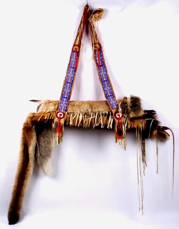 Montana Northern Plains Bow & Arrow Quiver: This is handcrafted by a Montana Indian Artist and is a contemporary piece done with fine skill and craftsmanship. This Bow & Arrow Quiver is made with Mountain Lion Tail, Wolf, Fox, also beaded and e