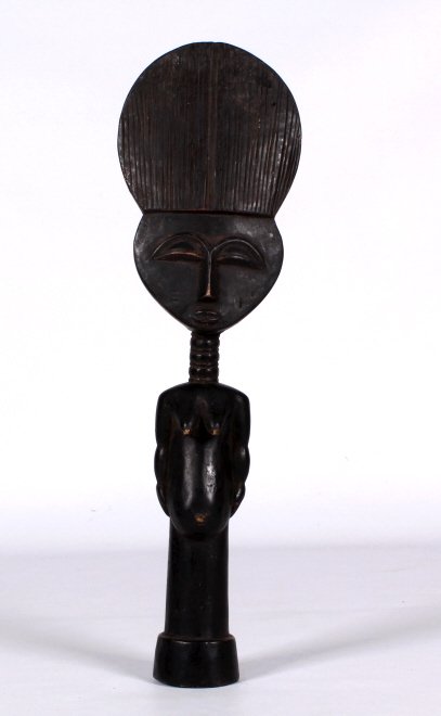 Ghana Tribal Carved Totem Sculpture: This is a large free staning hand carved sculpture of a woman figure showing a totem style. This piece is made of solid wood and is from the early 1900's. The sculptures has a large paddle style head 